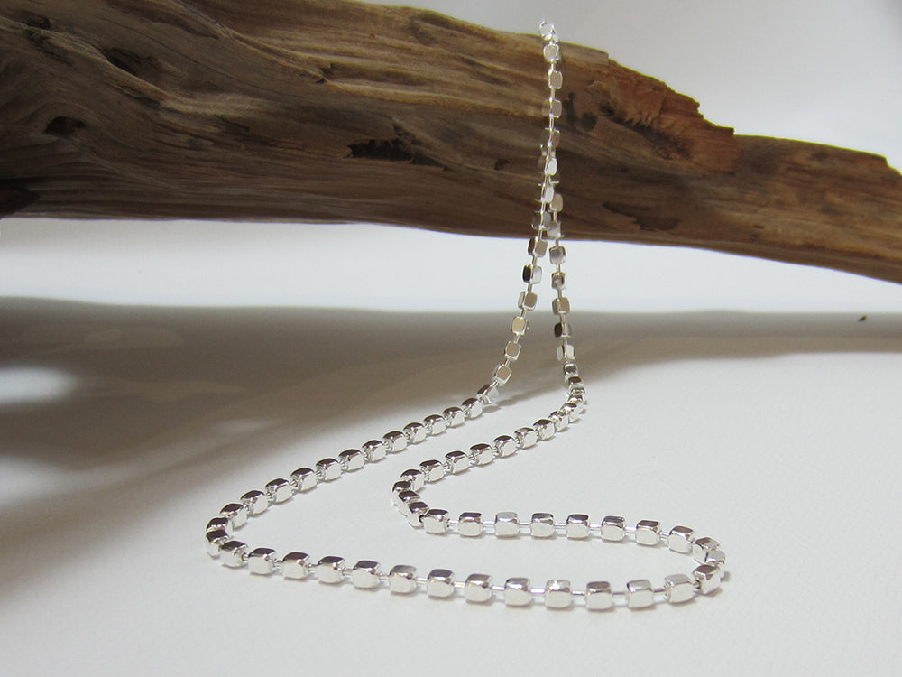 Made up of 3mm sterling silver cubes this necklace is 16" or 41cm long. 925 Silver Canterbury