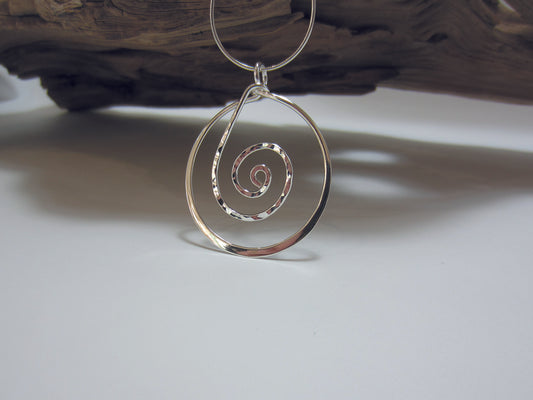 Sterling silver hammered spiral pendant with contrasting plain edge. 925 Canterbury